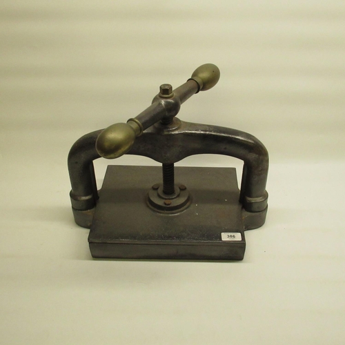 386 - Late C19th/early C20th cast iron book press, with brass terminals, W45cm D25cm H34cm