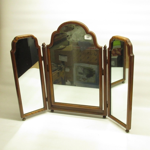 389 - Early C20th mahogany framed tryptic dressing table mirror, on turned feet, W75cm H59cm