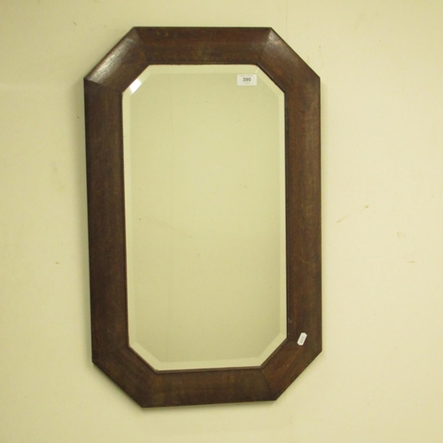 390 - 1930's oak framed bevelled edge wall mirror, with canted corners, W74.5cm H46cm