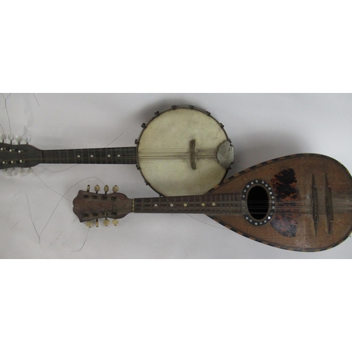 1410 - Ferrari & Co of Napoli 8 string mandolin decorated with mother of pearl, with segmented bent hardwoo... 