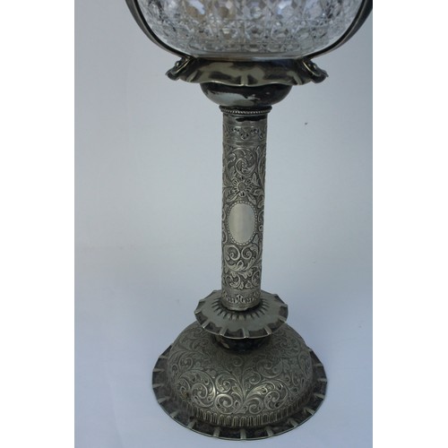 1248 - Late C19th Hukin and Heath silver plated oil lamp and matching candleholders, profusely embossed in ... 