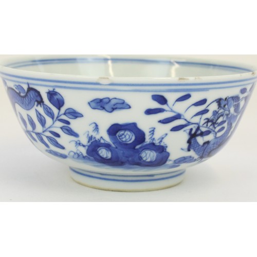 1361 - Late C18th Chinese Qianlong porcelain bowl painted in underglaze blue with dragons and foliage, four... 