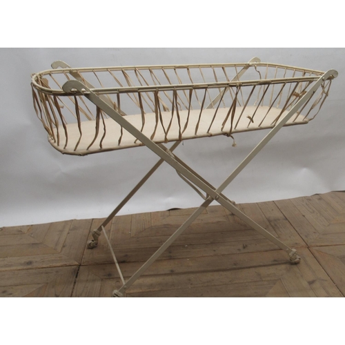 1392 - Early C20th folding wrought steel baby changing stand on marble casters, W49cm D104cm H80cm