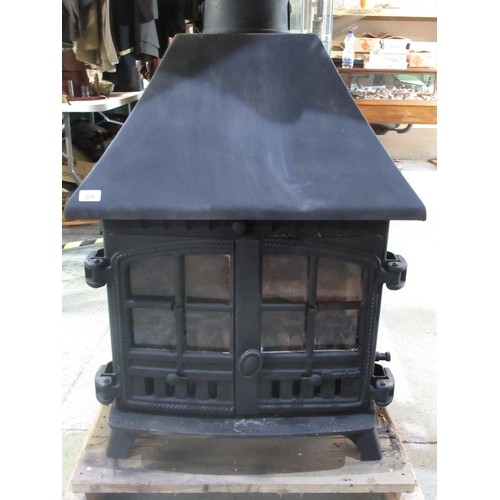 284 - Hunter Herald two door cast iron log burning stove with instructions, H66cm W45cm