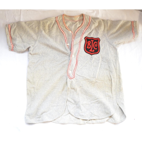 826 - WWII baseball kit comprising of shirt and trousers with BLCO badge, box of Louisville Slugger softba... 