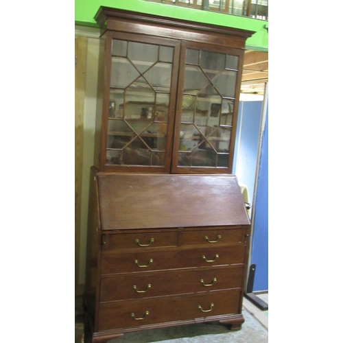 262 - C19th and later mahogany bureau bookcase, two glazed doors and fall front above two short and three ... 