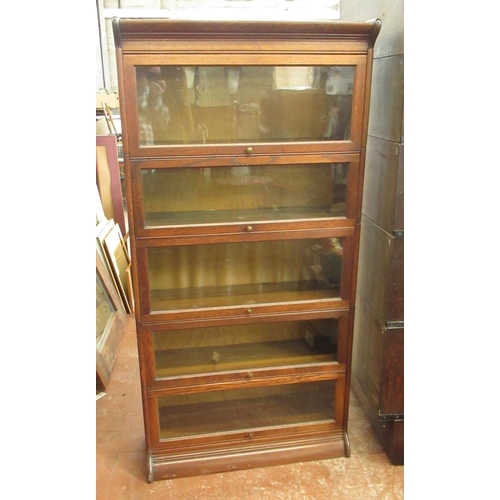 264 - C20th Globe-Wernicke type oak bookcase with five glazed tiers, on moulded base, W88cm D33cm H176cm