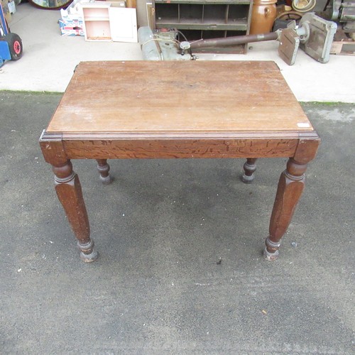 278 - Oak occasional table with carved legs and bun feet