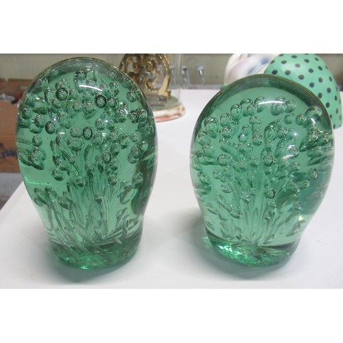 1337 - Pair of Victorian green glass end of day dump paperweights with internal bubble decoration, tallest ... 