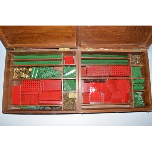 68 - Two large wooden boxes containing quantity of vintage Meccano pieces and instruction booklets