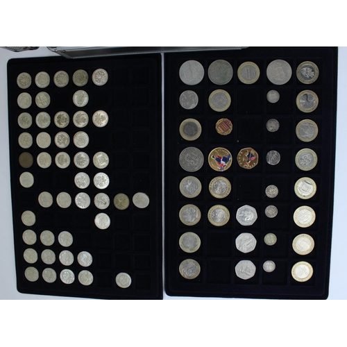 151 - Aluminium coin carry case containing five trays of collectable £1, £2, 50p, mixed pre-decimal US and... 