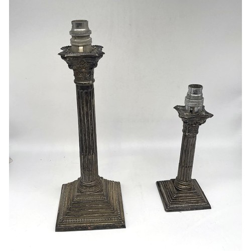 1332 - Graduated pair of ERII hallmarked silver Corinthian column table lamps, on stepped  weighted bases, ... 