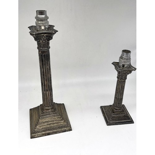 1332 - Graduated pair of ERII hallmarked silver Corinthian column table lamps, on stepped  weighted bases, ... 