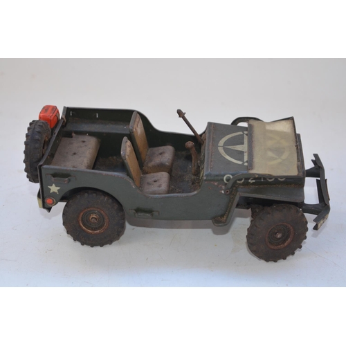 262 - Vintage Arnold tinplate US Army Jeep model, friction power mechanism not working, missing steering w... 