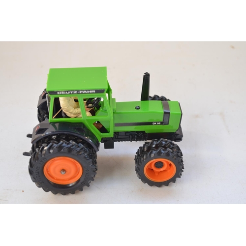 Four boxed 1/32 Britain's tractor models: Deutz-Fahr 8