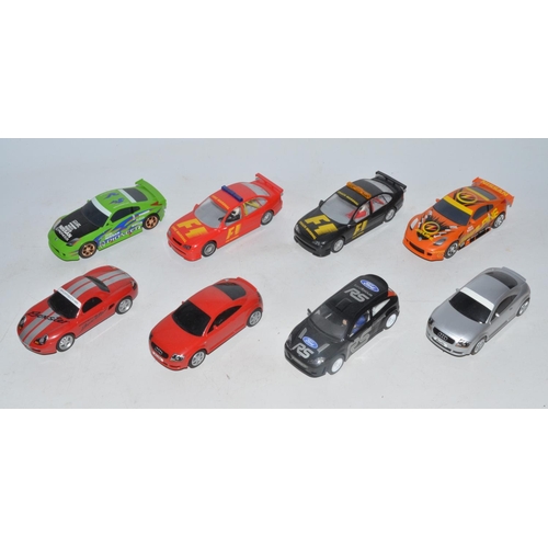 62 - Collection of Scalextric cars, track, crash barriers, controllers etc. Includes 8 cars and 4 motorbi... 