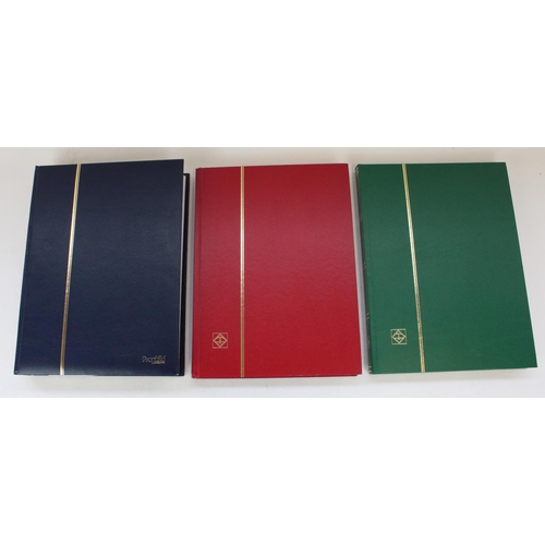 104 - Three albums of GB and commonwealth mint and used commemorative stamps, with a small selection of de... 