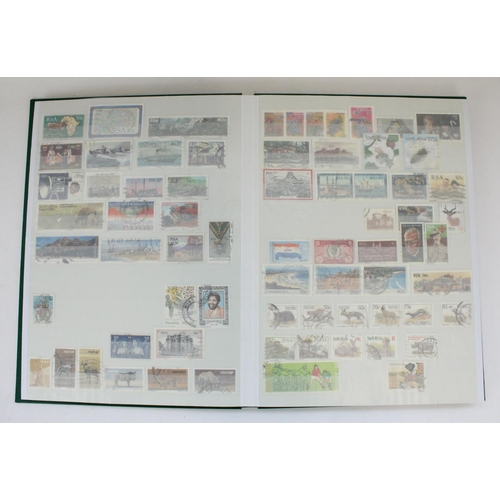 104 - Three albums of GB and commonwealth mint and used commemorative stamps, with a small selection of de... 