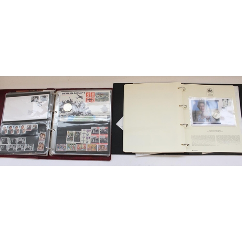 116 - Two albums of FDCs, presentation packs and coin covers