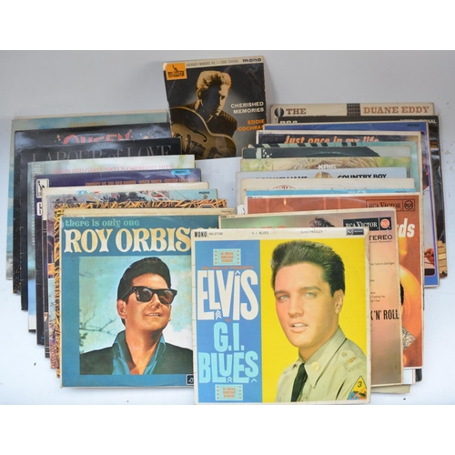 492 - Collection of musical CDs and vinyl records including folders of singles. Artists include Queen, Elv... 