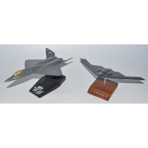 536 - Four promotional model aircraft SR71 Blackbird, F1 17 stealth fighter, US B2 bomber signed by two cr... 