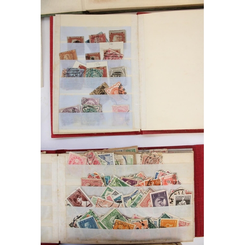 128 - Collection of loose world stamps in envelopes with three small folders