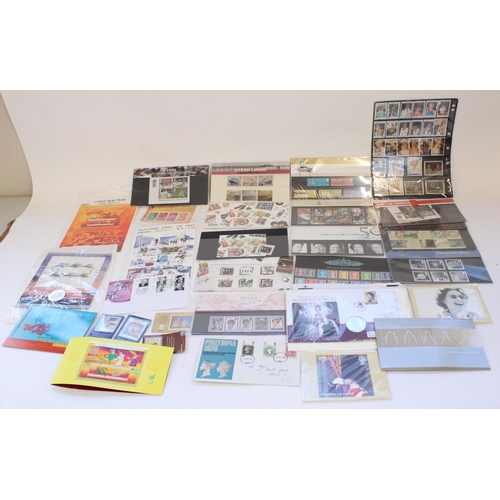 133 - Small selection of GB Royal Mint presentation packs and FDCs, world commemorative sets and a few coi... 