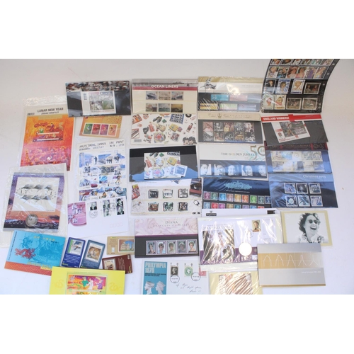 133 - Small selection of GB Royal Mint presentation packs and FDCs, world commemorative sets and a few coi... 