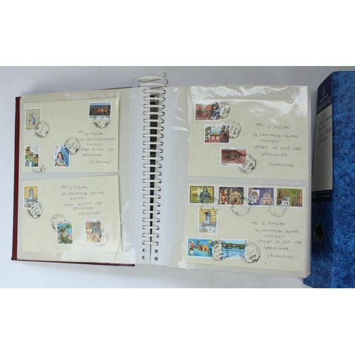 134 - Two folders of Royal Mail Mint presentatio stamp packs, FDCs and postmarked world letters and corres... 