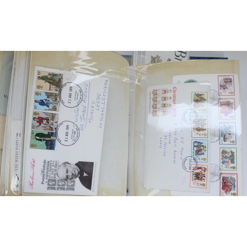 134 - Two folders of Royal Mail Mint presentatio stamp packs, FDCs and postmarked world letters and corres... 