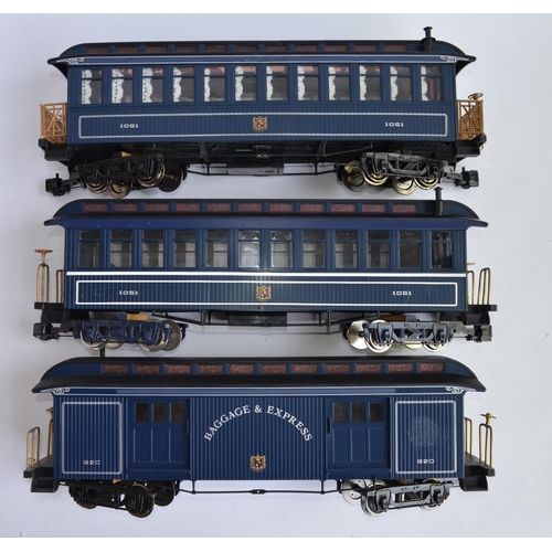 523 - Three boxed G-gauge railway carriages by Bachmann, 2 passenger and 1 post wagon. Both passenger wago... 