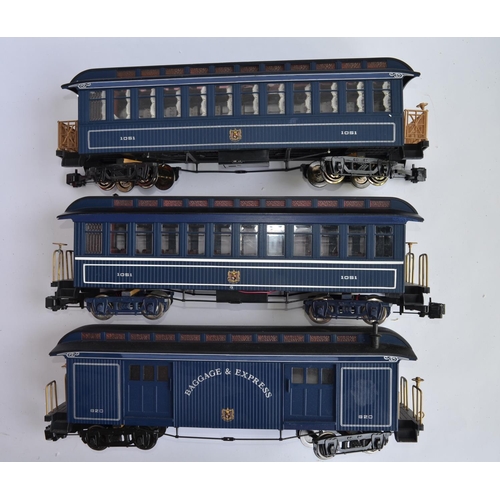 523 - Three boxed G-gauge railway carriages by Bachmann, 2 passenger and 1 post wagon. Both passenger wago... 