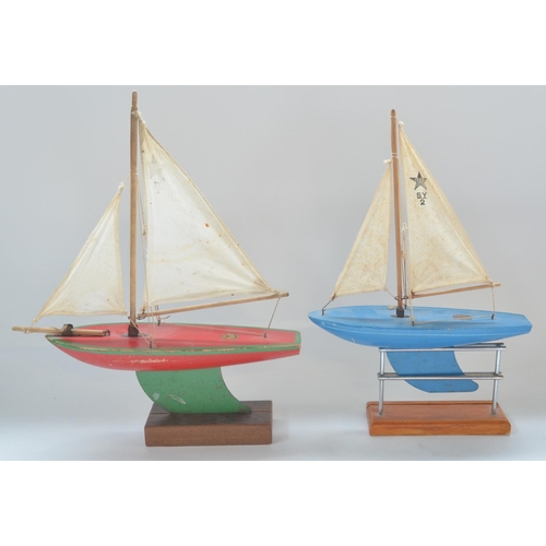 284 - Two Star Yachts pond sailing boats, SY2 and SY3, both in full working order with stands