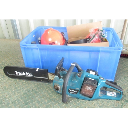 831 - Makita battery chainsaw, gloves, two helmets, etc