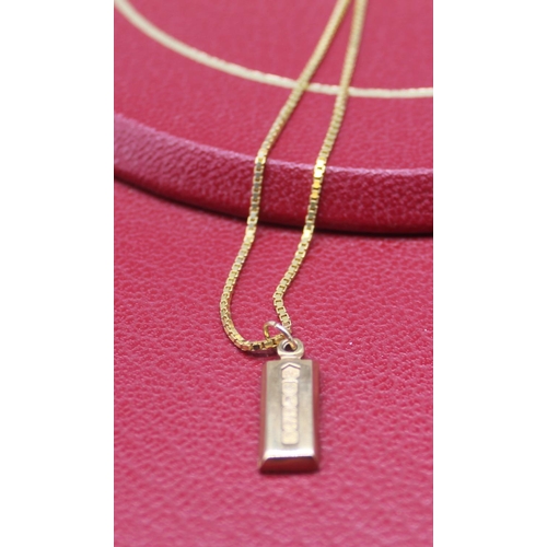 6 - 9ct yellow gold ingot pendant stamped 375, on a 9ct yellow gold chain stamped 375,  8.2g