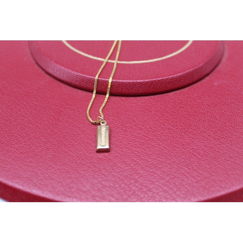 6 - 9ct yellow gold ingot pendant stamped 375, on a 9ct yellow gold chain stamped 375,  8.2g