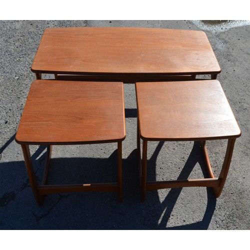 720 - 1960's teak Long John nest of three coffee tables, L98cm D50cm H50cm