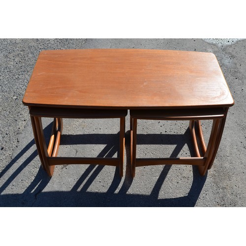 720 - 1960's teak Long John nest of three coffee tables, L98cm D50cm H50cm