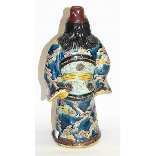 153 - Japanese Kutani porcelain model of a bearded warrior holding a sword, H39cm