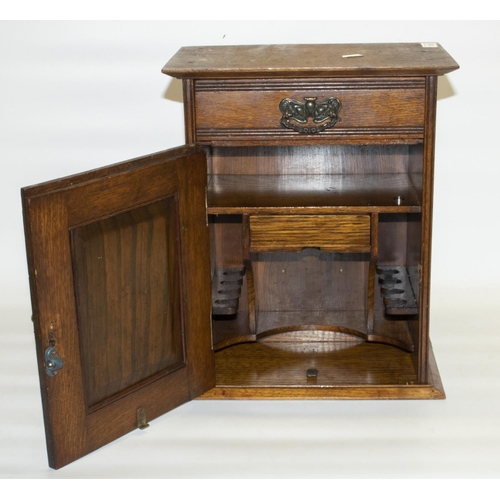 156 - C20th century Art Nouveau oak smoker’s cabinet, embossed copper panel of stylised flowers to door en... 