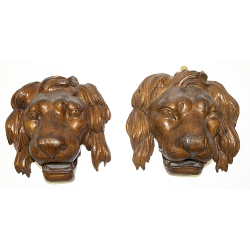 163 - Pair of 20th century medieval style carved oak lion head masks, H20cm (2)