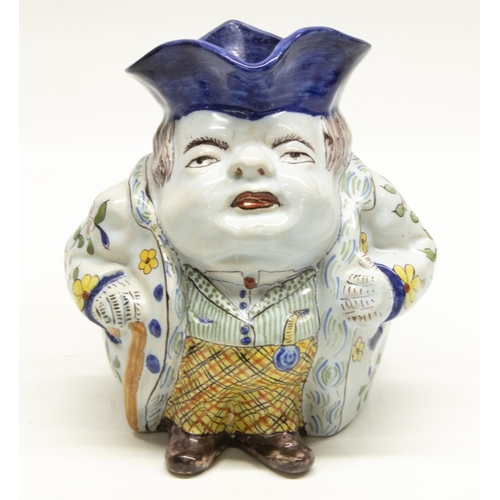 169 - C20th French faience Toby style jug, portly gentleman wearing floral jacket, H17.5cm