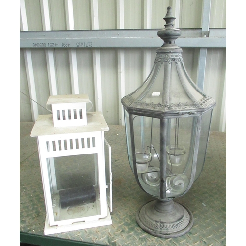 835 - Modern metal and glass candle lantern, and a white enamel candle lantern, H45cm (2)