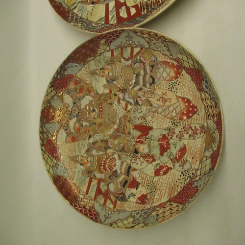 367 - A near pair of Japanese Satsuma chargers depicting Japanese Samurai