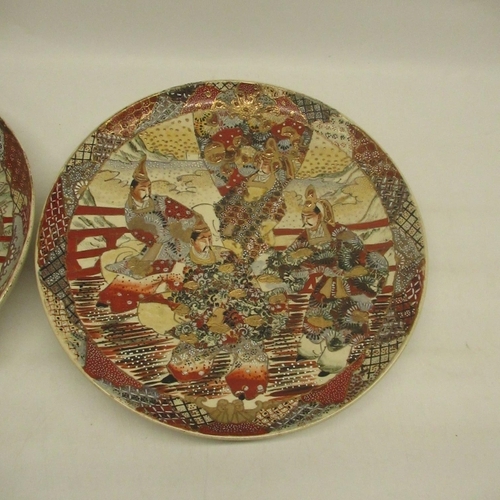 367 - A near pair of Japanese Satsuma chargers depicting Japanese Samurai