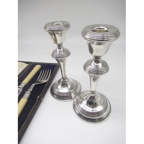 56 - Pair of ER.II hallmarked Sterling silver candlesticks with weighted bases, by W I Broadway & Co, Bir... 