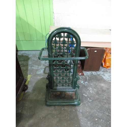 673 - Coalbrookdale style green painted cast iron stick stand, with arched scroll pierced back and removab... 