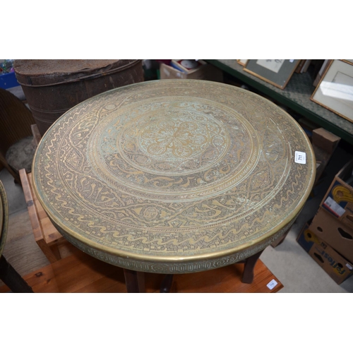 711 - C20th Indian Benaris brass top coffee table D60cm X H61cm