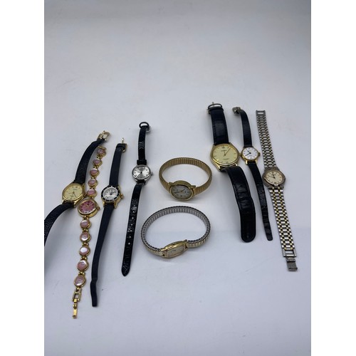 86 - Ladies 18k gold plated wristwatch set with pink stones, and a collection of ladies watches including... 