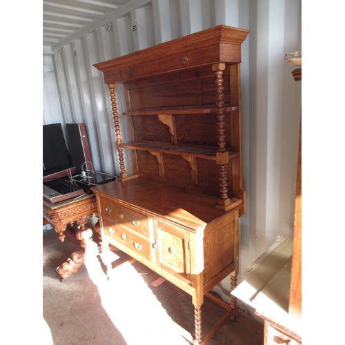 677 - C20th Dutch Oak Dresser, two shelf back with moulded cornice on bobbin support, two drawers enclosed... 